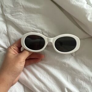 White Oval Sunglasses with Black Lenses